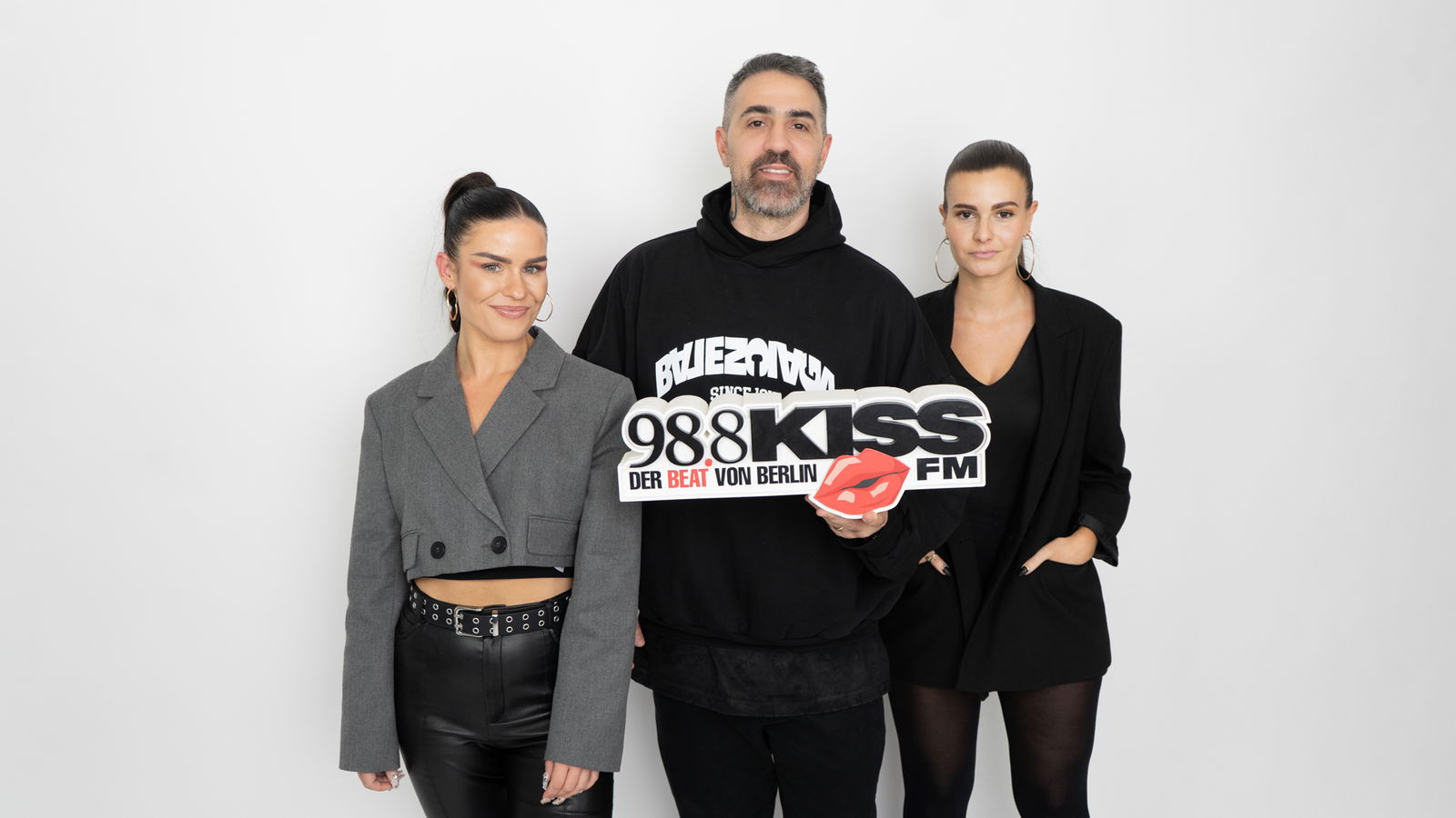 Rapper Bushido zusammen mit Karo und Mille von KISSFM 